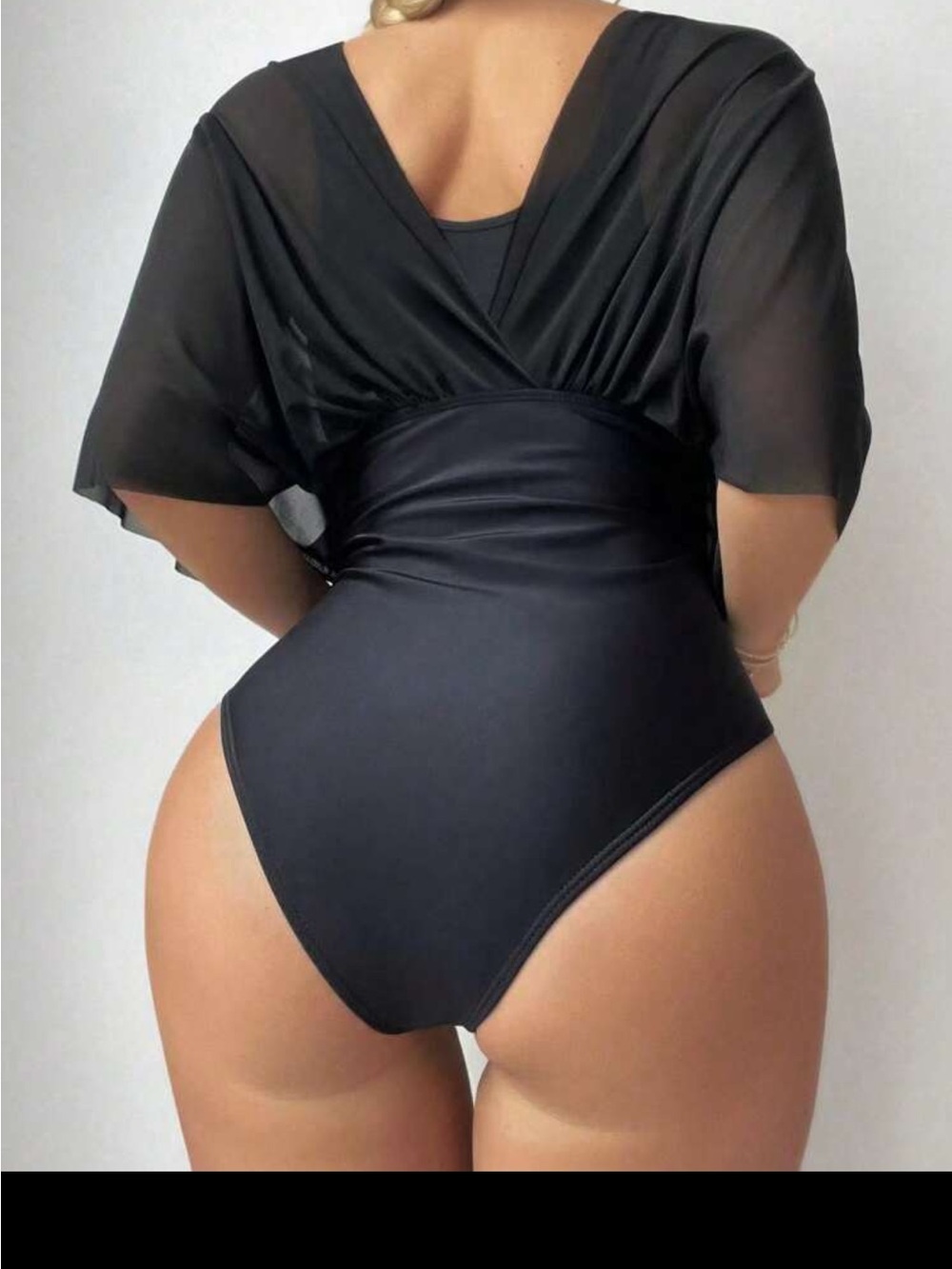 Black One-Piece Women’s Swimwear with Draped Sheer Top - Picture 2 of 4